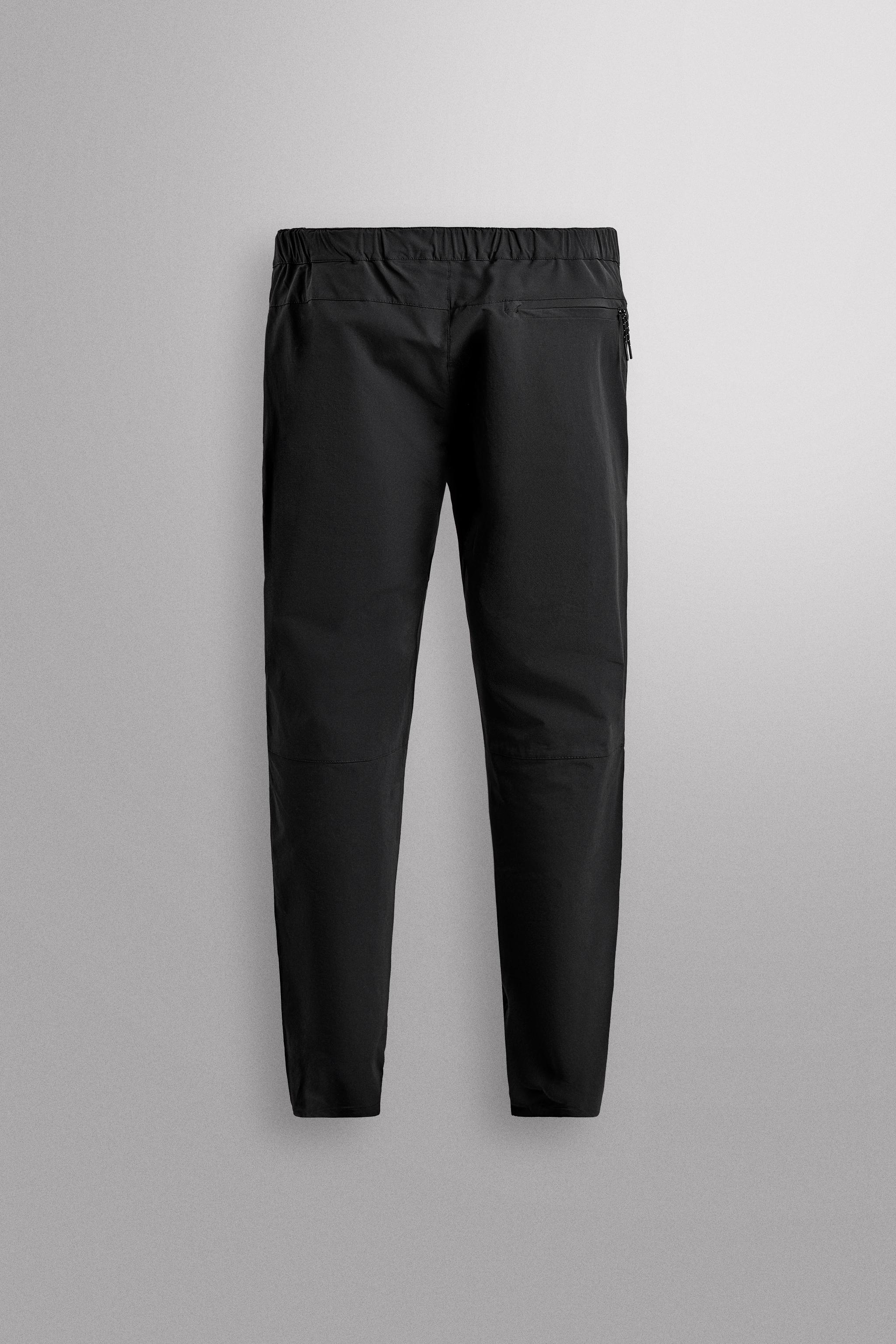 TECHNICAL PANTS WITH BELT